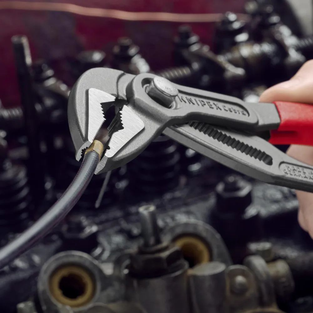 KNIPEX 87 51 250 Cobra® ES Wasserpumpenzange extra-schlank mit rutschhemmendem Kunststoff überzogen grau atramentiert 250 mm