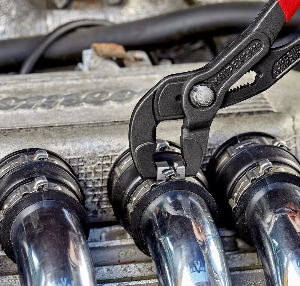 KNIPEX Schlauchschellenzange für Click-Schellen mit rutschhemmendem Kunststoff überzogen grau atramentiert 250 mm