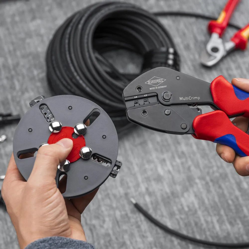 KNIPEX MultiCrimp® Crimpzange mit Wechselmagazin mit Mehrkomponenten-Hüllen brüniert 250 mm