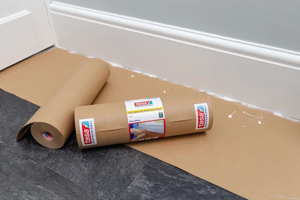 Tesa 74922-01 - klebendes Schutzpapier 50 m x 30 cm