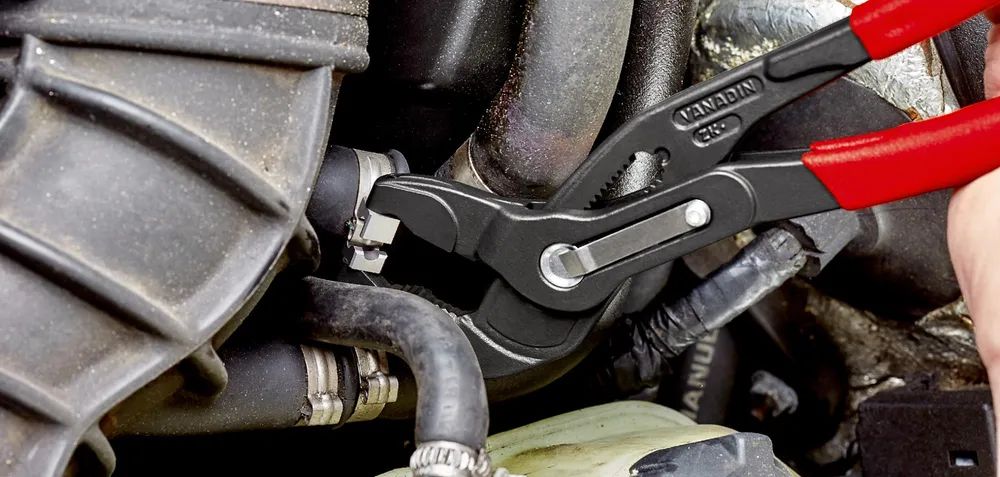 KNIPEX Schlauchschellenzange für Click-Schellen mit rutschhemmendem Kunststoff überzogen grau atramentiert 250 mm