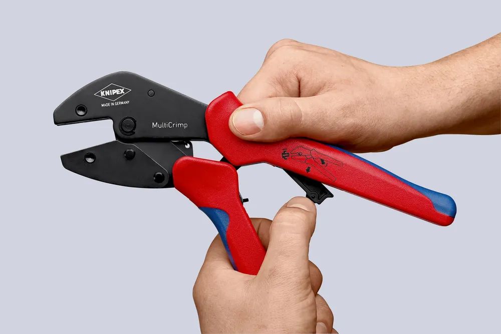 KNIPEX MultiCrimp® Crimpzange mit Wechselmagazin mit Mehrkomponenten-Hüllen brüniert 250 mm